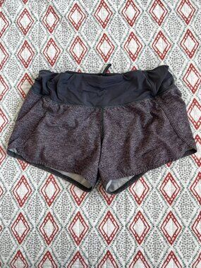 These are Lululemon Run Times Short II in the Heather Lux Size 4